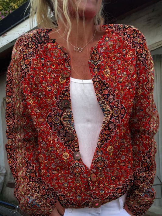 Huberta | Gebreid vest met rijke ornamentprint